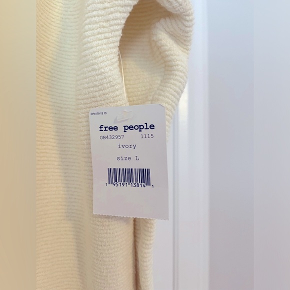 Free people Ivory Ottoman Slouchy Tunic size large - Picture 7 of 7
